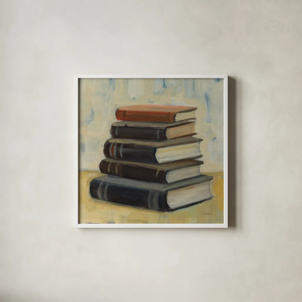 Books on the Porch I Sq by Silvia Vassileva. Shown in a crisp white glass frame for a clean and minimalist style. Available as an archival giclee rolled canvas, fine art paper, or poster print. SKU 99048a.