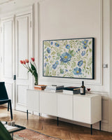 Botanical Blue I by Silvia Vassileva. shown as a framed stretched canvas in a living room above a console. Available as a archival giclee rolled canvas, fine art paper, or poster print. SKU 61779i.
