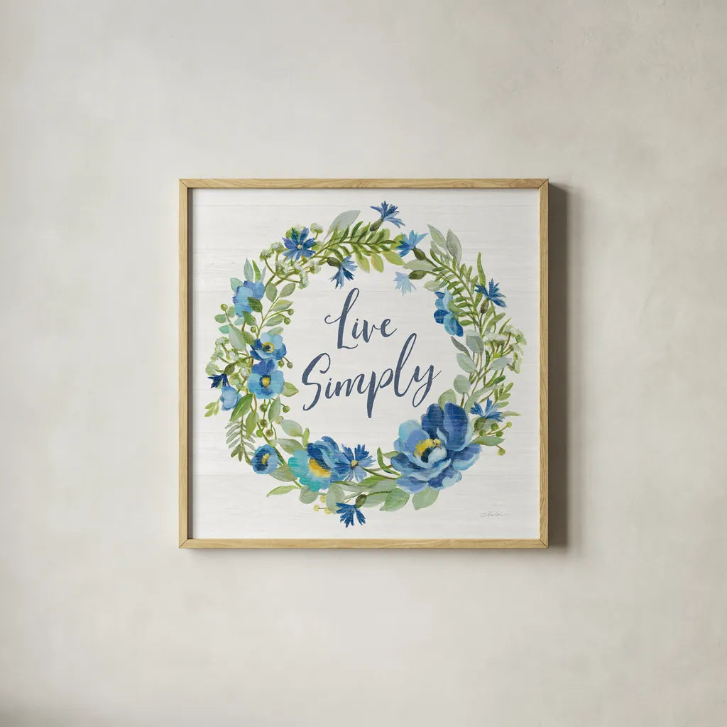 Botanical Blue VI by Silvia Vassileva. Shown in a natural wood glass frame for a timeless modern aesthetic. Available as an archival giclee rolled canvas, fine art paper, or poster print. SKU 61784a.