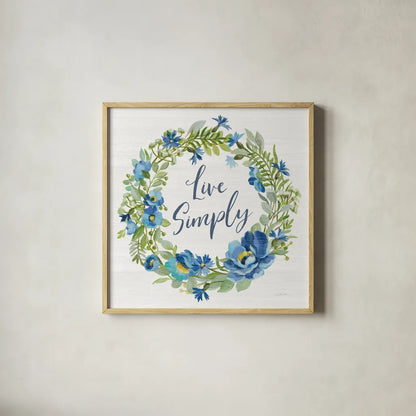 Botanical Blue VI by Silvia Vassileva. Shown in a natural wood glass frame for a timeless modern aesthetic. Available as an archival giclee rolled canvas, fine art paper, or poster print. SKU 61784a.