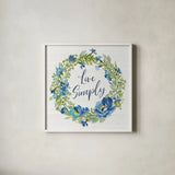Botanical Blue VI by Silvia Vassileva. Shown in a crisp white glass frame for a clean and minimalist style. Available as an archival giclee rolled canvas, fine art paper, or poster print. SKU 61784a.