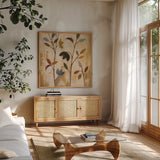 Branches at Sunrise V by Silvia Vassileva. Shown in a natural wood frame in a cozy modern living room. Available as an archival giclee rolled canvas, fine art paper, or poster print. SKU 36096a.