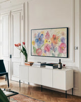 Bright Aquarelle Flowers by Silvia Vassileva. shown as a framed stretched canvas in a living room above a console. Available as a archival giclee rolled canvas, fine art paper, or poster print. SKU 19036i.
