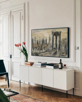 Brooklyn Bridge Gray and Gold by Silvia Vassileva. shown as a framed stretched canvas in a living room above a console. Available as a archival giclee rolled canvas, fine art paper, or poster print. SKU 44892i.