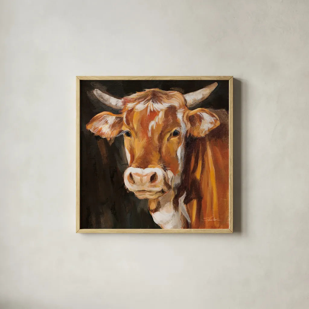 Brown Cow on Black by Silvia Vassileva. Shown in a natural wood glass frame for a timeless modern aesthetic. Available as an archival giclee rolled canvas, fine art paper, or poster print. SKU 96642a.
