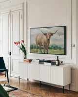 Brown Longhorn Cow by Silvia Vassileva. shown as a framed stretched canvas in a living room above a console. Available as a archival giclee rolled canvas, fine art paper, or poster print. SKU 96641i.