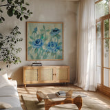 Brushy Blue Flowers II by Silvia Vassileva. Shown in a natural wood frame in a cozy modern living room. Available as an archival giclee rolled canvas, fine art paper, or poster print. SKU 49267a.