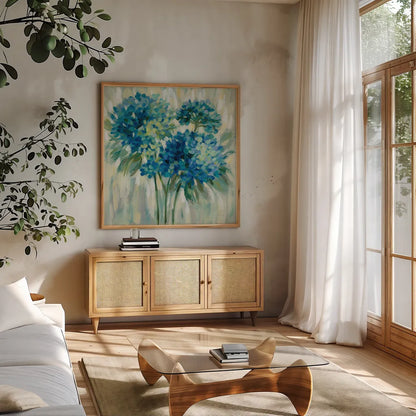 Burst of Hydrangeas by Silvia Vassileva. Shown in a natural wood frame in a cozy modern living room. Available as an archival giclee rolled canvas, fine art paper, or poster print. SKU 50134a.