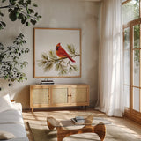 Cardinal Christmas V on White by Silvia Vassileva. Shown in a natural wood frame in a cozy modern living room. Available as an archival giclee rolled canvas, fine art paper, or poster print. SKU 68924a.