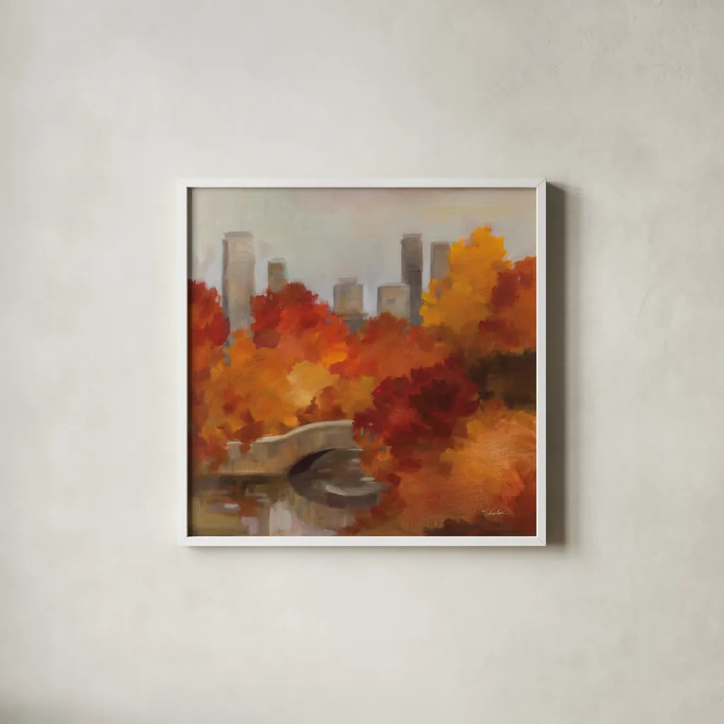 Central Park Autumn by Silvia Vassileva. Shown in a crisp white glass frame for a clean and minimalist style. Available as an archival giclee rolled canvas, fine art paper, or poster print. SKU 102490a.
