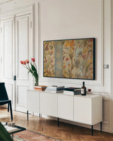 Charmed Garden Tapestry by Silvia Vassileva. shown as a framed stretched canvas in a living room above a console. Available as a archival giclee rolled canvas, fine art paper, or poster print. SKU 60315i.