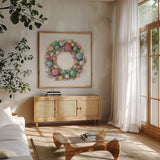 Christmas Glamour Wreath by Silvia Vassileva. Shown in a natural wood frame in a cozy modern living room. Available as an archival giclee rolled canvas, fine art paper, or poster print. SKU 65238a.