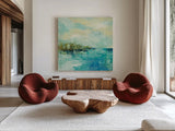 Cliff Side Town Crop by Silvia Vassileva. Shown as extra-large giant wall art in a modern living room. Available as an archival giclee rolled canvas, fine art paper, or poster print. SKU 28118a.