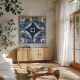 Coast Lines II Indigo and Cream by Silvia Vassileva. Shown in a natural wood frame in a cozy modern living room. Available as an archival giclee rolled canvas, fine art paper, or poster print. SKU 29275a.