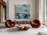 Coastal Blues I by Silvia Vassileva. Shown as extra-large giant wall art in a modern living room. Available as an archival giclee rolled canvas, fine art paper, or poster print. SKU 84817a.