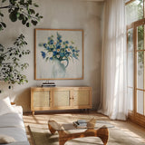 Coastal Bouquet Light by Silvia Vassileva. Shown in a natural wood frame in a cozy modern living room. Available as an archival giclee rolled canvas, fine art paper, or poster print. SKU 54282a.