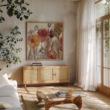 Contemporary Botanical Cream II by Silvia Vassileva. Shown in a natural wood frame in a cozy modern living room. Available as an archival giclee rolled canvas, fine art paper, or poster print. SKU 26500a.
