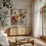 Contemporary Botanical Cream III by Silvia Vassileva. Shown in a natural wood frame in a cozy modern living room. Available as an archival giclee rolled canvas, fine art paper, or poster print. SKU 26501a.