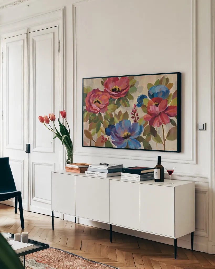 Coral and Blue Flowers by Silvia Vassileva. shown as a framed stretched canvas in a living room above a console. Available as a archival giclee rolled canvas, fine art paper, or poster print. SKU 20559i.