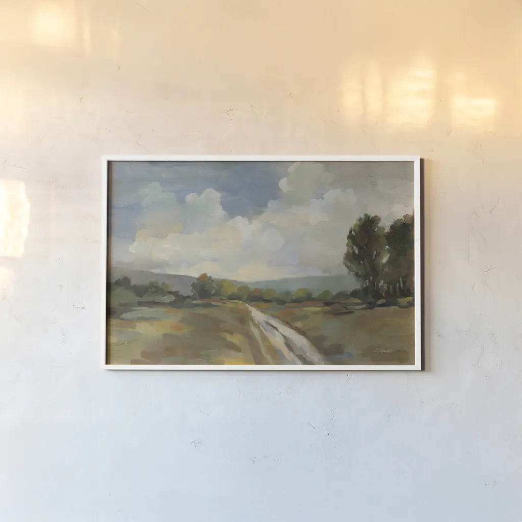 Countryside View by Silvia Vassileva. shown as a paper print in a white frame. Available as a archival giclee rolled canvas, fine art paper, or poster print. SKU 95134i.