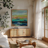 Delmar Sunset III by Silvia Vassileva. Shown in a natural wood frame in a cozy modern living room. Available as an archival giclee rolled canvas, fine art paper, or poster print. SKU 48517a.