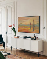 Desert Saguaro by Silvia Vassileva. shown as a framed stretched canvas in a living room above a console. Available as a archival giclee rolled canvas, fine art paper, or poster print. SKU 63978i.
