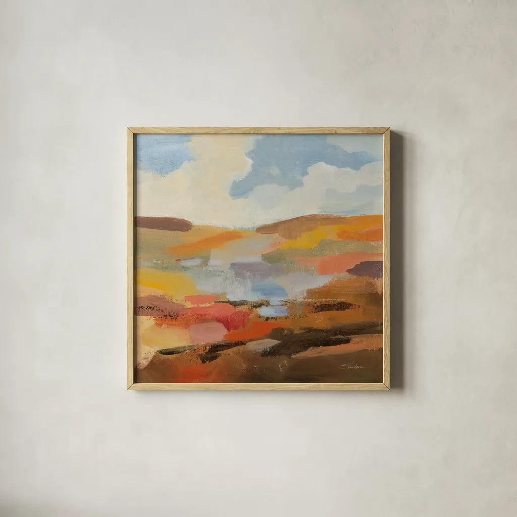 Desert Sky I by Silvia Vassileva. Shown in a natural wood glass frame for a timeless modern aesthetic. Available as an archival giclee rolled canvas, fine art paper, or poster print. SKU 85387a.