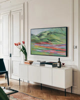 Emerald Mountain by Silvia Vassileva. shown as a framed stretched canvas in a living room above a console. Available as a archival giclee rolled canvas, fine art paper, or poster print. SKU 90995i.