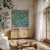 Emerald Paisley II by Silvia Vassileva. Shown in a natural wood frame in a cozy modern living room. Available as an archival giclee rolled canvas, fine art paper, or poster print. SKU 64820a.
