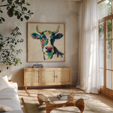 Expressionistic Cow II by Silvia Vassileva. Shown in a natural wood frame in a cozy modern living room. Available as an archival giclee rolled canvas, fine art paper, or poster print. SKU 49920a.
