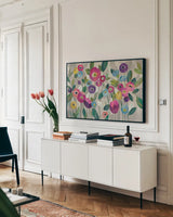 Fairy Tale Flowers V Pink by Silvia Vassileva. shown as a framed stretched canvas in a living room above a console. Available as a archival giclee rolled canvas, fine art paper, or poster print. SKU 29183i.
