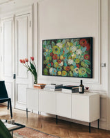 Fiesta Floral Flipped by Silvia Vassileva. shown as a framed stretched canvas in a living room above a console. Available as a archival giclee rolled canvas, fine art paper, or poster print. SKU 37302i.