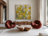 Floating Yellow Flowers IV by Silvia Vassileva. Shown as extra-large giant wall art in a modern living room. Available as an archival giclee rolled canvas, fine art paper, or poster print. SKU 27814a.