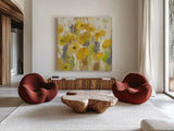 Floating Yellow Flowers V by Silvia Vassileva. Shown as extra-large giant wall art in a modern living room. Available as an archival giclee rolled canvas, fine art paper, or poster print. SKU 27815a.