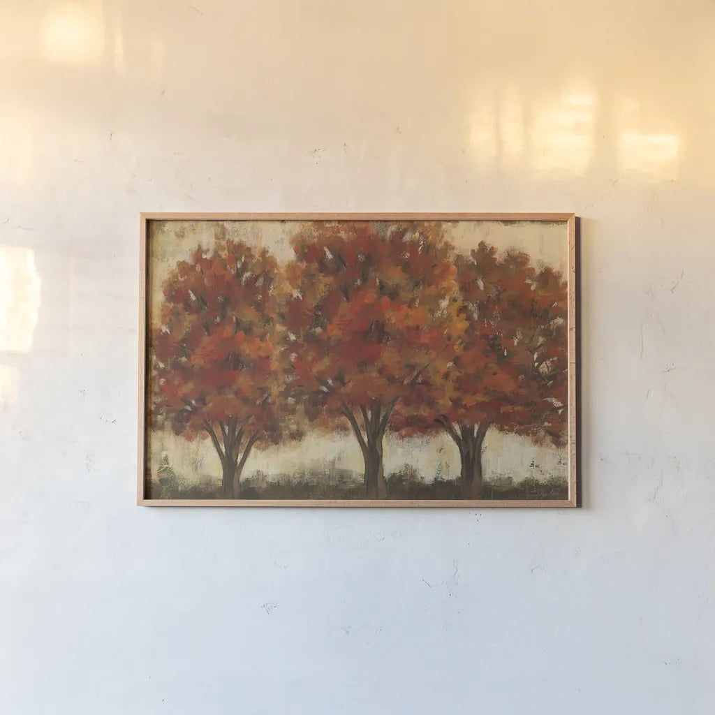 Glowing Trees Trio by Silvia Vassileva. shown as a paper print in a natural frame. Available as a archival giclee rolled canvas, fine art paper, or poster print. SKU 60445i.