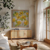Golden Bloom II by Silvia Vassileva. Shown in a natural wood frame in a cozy modern living room. Available as an archival giclee rolled canvas, fine art paper, or poster print. SKU 23824a.