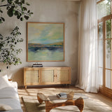Golden Fields by the River by Silvia Vassileva. Shown in a natural wood frame in a cozy modern living room. Available as an archival giclee rolled canvas, fine art paper, or poster print. SKU 62959a.