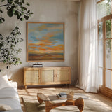 High Desert Sky II Bright Blue by Silvia Vassileva. Shown in a natural wood frame in a cozy modern living room. Available as an archival giclee rolled canvas, fine art paper, or poster print. SKU 55345a.