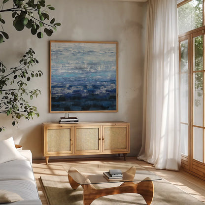 Icelandic Wave by Silvia Vassileva. Shown in a natural wood frame in a cozy modern living room. Available as an archival giclee rolled canvas, fine art paper, or poster print. SKU 35831a.
