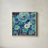 Indigo Flowers II by Silvia Vassileva. Shown in a natural wood glass frame for a timeless modern aesthetic. Available as an archival giclee rolled canvas, fine art paper, or poster print. SKU 17814a.