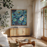 Indigo Flowers II by Silvia Vassileva. Shown in a natural wood frame in a cozy modern living room. Available as an archival giclee rolled canvas, fine art paper, or poster print. SKU 17814a.