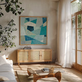 Indigo Geo Metric II Soft by Silvia Vassileva. Shown in a natural wood frame in a cozy modern living room. Available as an archival giclee rolled canvas, fine art paper, or poster print. SKU 30773a.