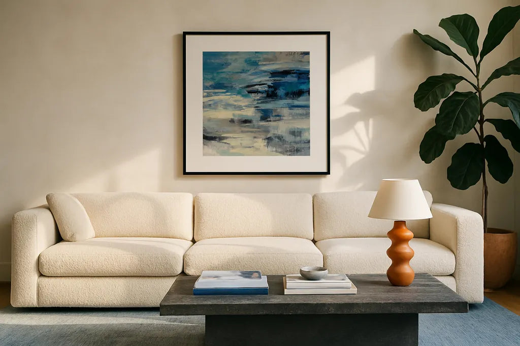 Indigo Wave by Silvia Vassileva. Displayed in a glass frame with matte in a clean modern living room. Available as an archival giclee rolled canvas, fine art paper, or poster print. SKU 21582a.