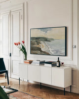 Irish Coast Dark by Silvia Vassileva. shown as a framed stretched canvas in a living room above a console. Available as a archival giclee rolled canvas, fine art paper, or poster print. SKU 89279i.