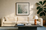January Branches Green v2 by Silvia Vassileva. Displayed in a glass frame with matte in a clean modern living room. Available as an archival giclee rolled canvas, fine art paper, or poster print. SKU 49789a.