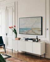 June Beach by Silvia Vassileva. shown as a framed stretched canvas in a living room above a console. Available as a archival giclee rolled canvas, fine art paper, or poster print. SKU 100288i.