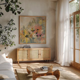 June Flower Bed by Silvia Vassileva. Shown in a natural wood frame in a cozy modern living room. Available as an archival giclee rolled canvas, fine art paper, or poster print. SKU 55657a.