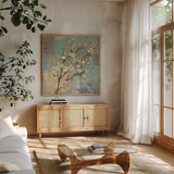 Kyoto Blossoms I by Silvia Vassileva. Shown in a natural wood frame in a cozy modern living room. Available as an archival giclee rolled canvas, fine art paper, or poster print. SKU 1041a.
