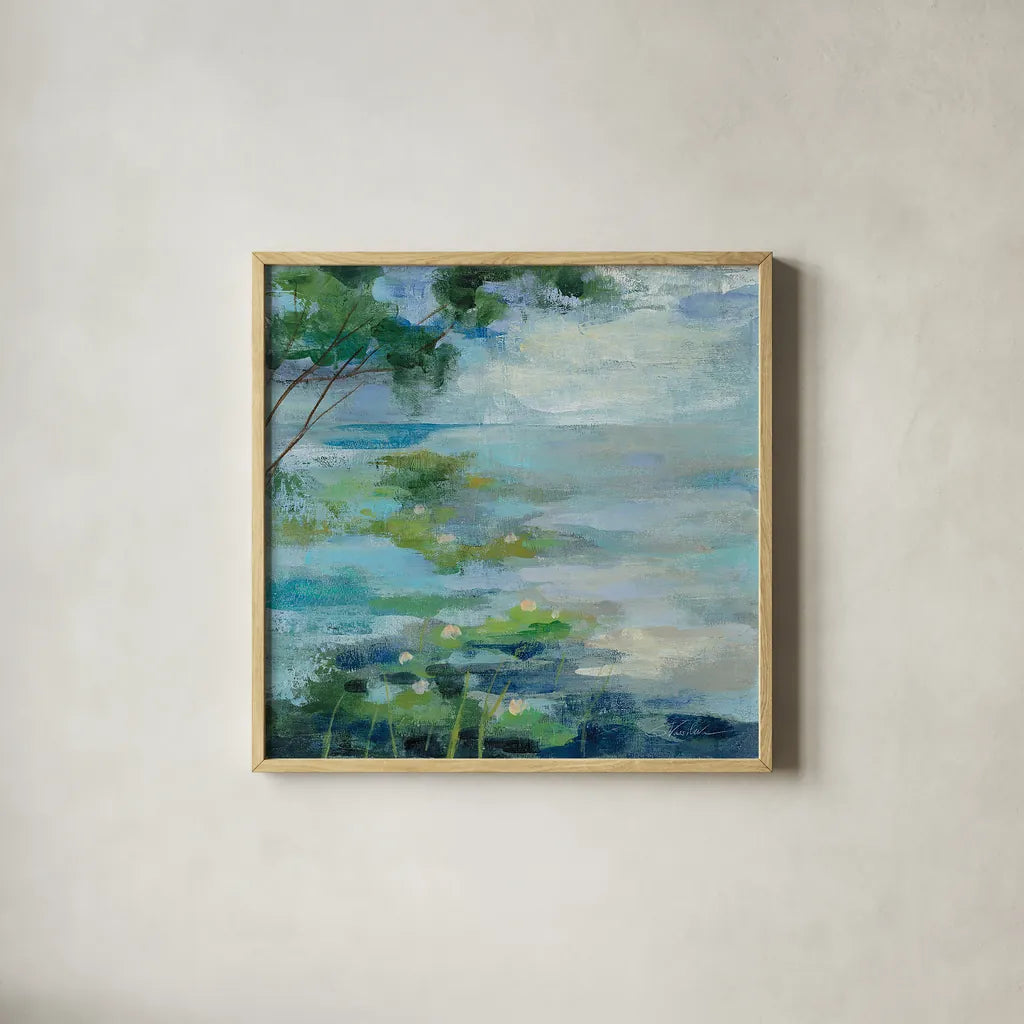 Lily Pond I by Silvia Vassileva. Shown in a natural wood glass frame for a timeless modern aesthetic. Available as an archival giclee rolled canvas, fine art paper, or poster print. SKU 18560a.