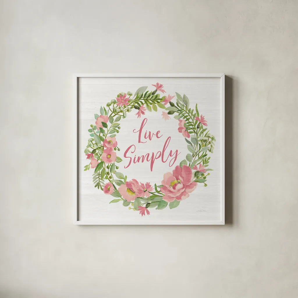 Live Simply Blush by Silvia Vassileva. Shown in a crisp white glass frame for a clean and minimalist style. Available as an archival giclee rolled canvas, fine art paper, or poster print. SKU 61860a.